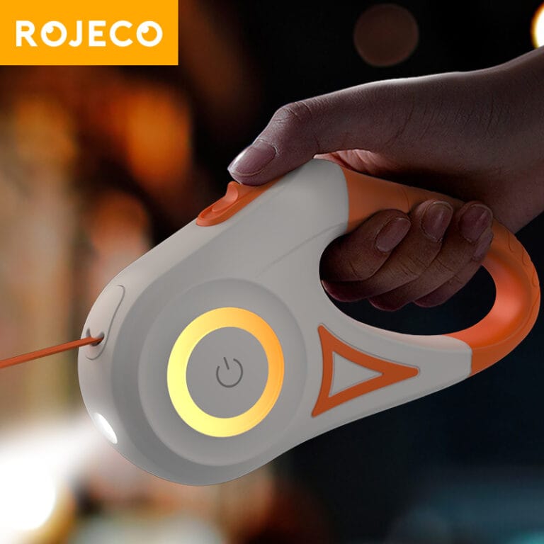 Laisse rétractable automatique pour chien avec LED intégrée, poignée ergonomique et cordon solide.